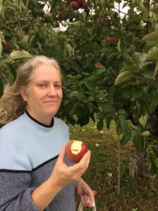 Vicki eating an apple